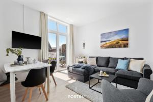 Posezení v ubytování Ferienwohnung Freigeist, App 16 Emmelsbüll