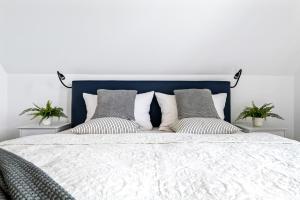 Giường trong phòng chung tại Lütte Diekhuus