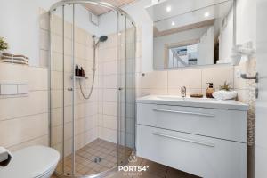 Phòng tắm tại Ferienhaus Strandmuschel Marina Wendtorf +16 ảnh