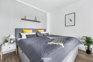 Postel nebo postele na pokoji v ubytování Meerzeit Damp