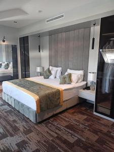 Postel nebo postele na pokoji v ubytování Livello Hotel
