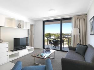 Un lugar para sentarse en Oaks Mackay Carlyle Suites