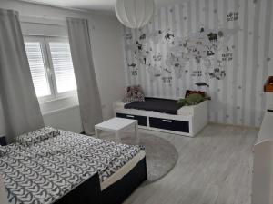 Postel nebo postele na pokoji v ubytování Vila Sava