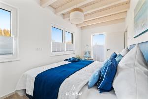 Postel nebo postele na pokoji v ubytování Haus Blaue Blume