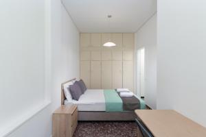 Posteľ alebo postele v izbe v ubytovaní Anassa 10 Boutique Apartment