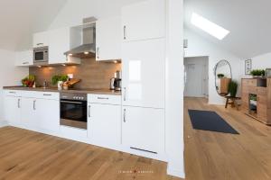 Kuchyň nebo kuchyňský kout v ubytování Mehrblick