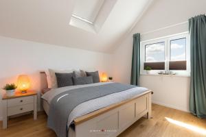 Postel nebo postele na pokoji v ubytování Mehrblick