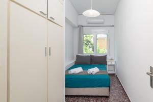 Posteľ alebo postele v izbe v ubytovaní Anassa 10 Boutique Apartment