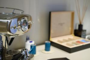 a camera sitting on top of a counter next to a box at Gianfranco Fino Viticoltore in Manduria