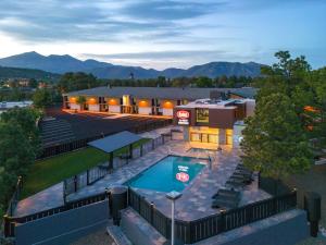 an aerial view of a hotel with a swimming pool at Aiden by Best Western Flagstaff in Flagstaff