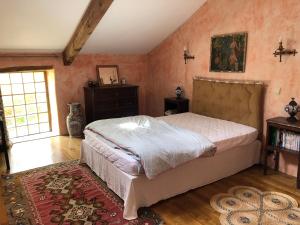 Un pat sau paturi într-o cameră la Gascony Guest House