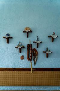 a bunch of different types of mushrooms on a wall at Villa Vasiliki in Leptokaria