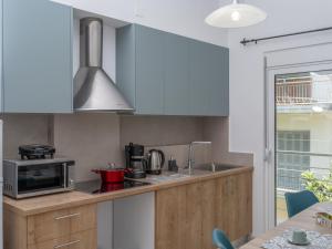 Kuchyňa alebo kuchynka v ubytovaní Anassa 10 Boutique Apartment
