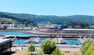a view of a marina with boats in the water at El Mirador 2 in Viveiro