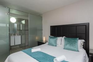 Cama ou camas em um quarto em San Lameer Villa 10401 - 1 Bedroom Classic - 2 pax - San Lameer Rental Agency