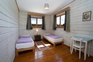 Postel nebo postele na pokoji v ubytování Clil Guest House