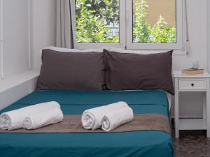 Posteľ alebo postele v izbe v ubytovaní Anassa 10 Boutique Apartment