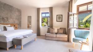 Llit o llits en una habitació de Hotel Soyka