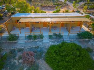 an overhead view of a house with a roof at Exoristoi Nature Suites in Gavdos