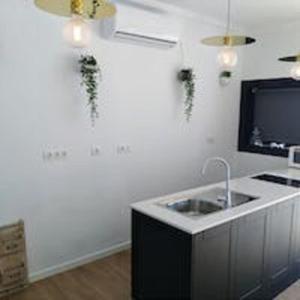 Kuchyňa alebo kuchynka v ubytovaní La Concha Boutique Apartments - Adults Only