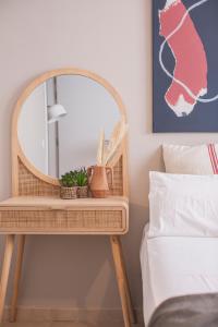 Łóżko lub łóżka w pokoju w obiekcie Apartamentos Martalia Áticos Deluxe