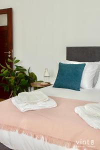 Katil atau katil-katil dalam bilik di Apartamento do Arquinho II- by VinteOito +39 gambar