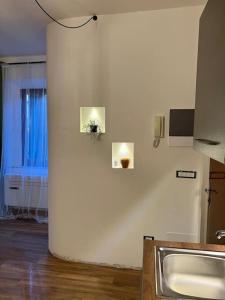TV a/nebo společenská místnost v ubytování Orizzonti Toscani new apartment with view and pool