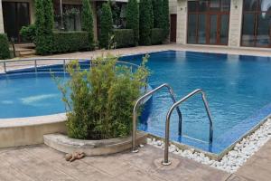 Swimmingpoolen hos eller tæt på Panoramic Sea View Apartment + 26 billeder