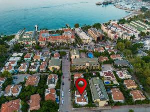 an aerial view of a city with a red marker at AQUA Suite Kemer in Kemer