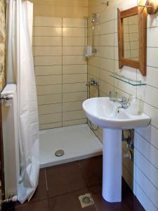 Bilik mandi di Nimbus Guesthouse