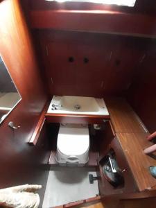 an overhead view of a toilet in a boat at Jachta Varuna in Nida