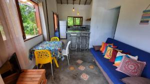 A seating area at Refúgio do Sargi Casas de Temporada - Nossa Xodó