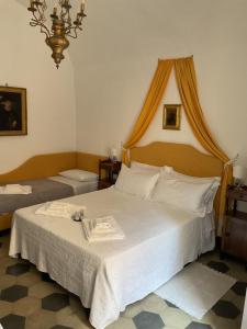 Posteľ alebo postele v izbe v ubytovaní Bed & Breakfast Scià Dina