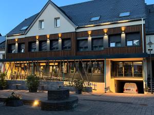 a large building with a lot of windows at Hochwald Lodge in Morbach