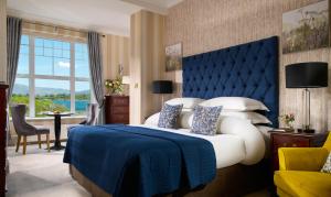 Ein Bett oder Betten in einem Zimmer der Unterkunft Parknasilla Resort & Spa