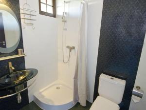 a bathroom with a toilet and a sink and a shower at Veluwe Retreat w Garden in Cisowo +32 photos