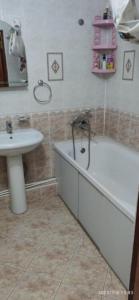Ett badrum på Просторная квартира в центре Тирасполя!