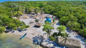 an aerial view of a beach with a resort at El Cocotal Tintipán By Ashram in Tintipan Island