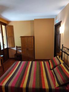 Cama o camas de una habitación en Hotel Doña Gaudiosa