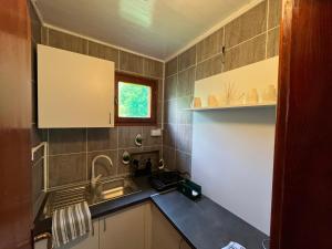 Kuchyň nebo kuchyňský kout v ubytování Apartman KOD PECE