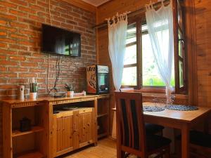 Kuchyň nebo kuchyňský kout v ubytování Apartman KOD PECE