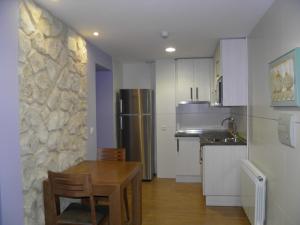 Kuchyň nebo kuchyňský kout v ubytování Apartamentos Turísticos Peñafiel