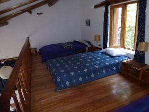 Llit o llits en una habitació de Andean Spirit Lodge