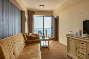 TV a/nebo společenská místnost v ubytování Hotel Hawaii