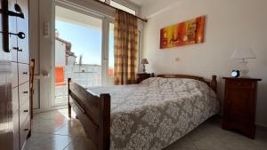 Postel nebo postele na pokoji v ubytování Kagiabis' Home