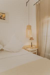 Postel nebo postele na pokoji v ubytování Palais Chadmi