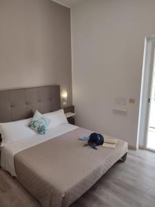 Postel nebo postele na pokoji v ubytování Hotel Madera