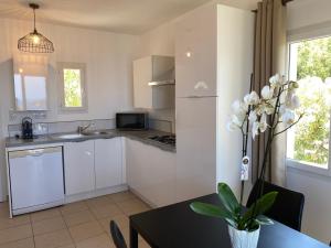 Кухня или мини-кухня в La Citadelle Appartements
