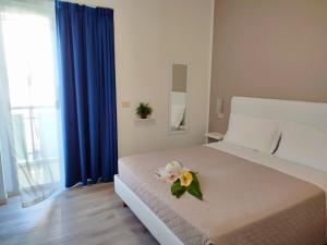 Postel nebo postele na pokoji v ubytování Hotel Madera