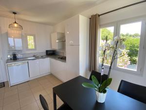 Кухня или мини-кухня в La Citadelle Appartements
